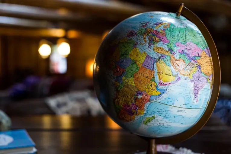globe showing Africa, Middle East, Europe, and part of Asia on desk