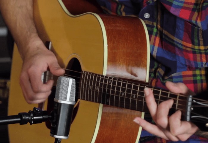 Musician recording guitar lessons in Colchester, Essex, providing guitar tuition in Ipswich, Suffolk.