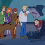 Scooby Doo and the gang unmasking a villain