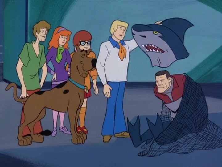 Scooby Doo and the gang unmasking a villain