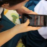 High school girl playing games