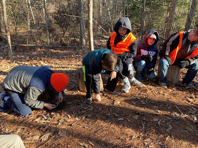 students outdoors in science class