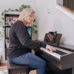 Intermediate piano practice involves scales and arpeggios