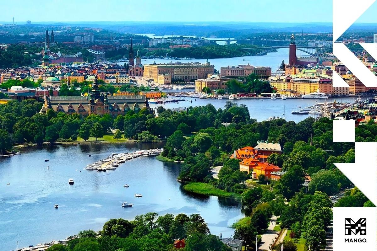 A vibrant Swedish city center with historical buildings and bridges, showcasing urban life and architecture