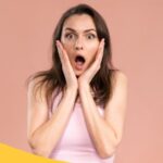 A woman holding her face, looking shocked, and mistakes in studying