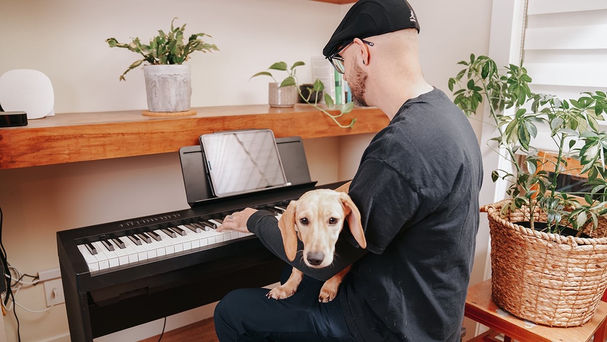 Man practicing piano