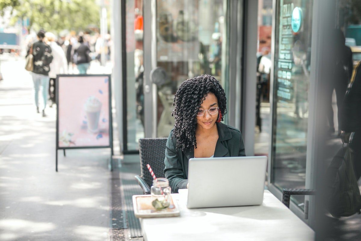 Man using laptop in a bright office. Where to Start Learning C